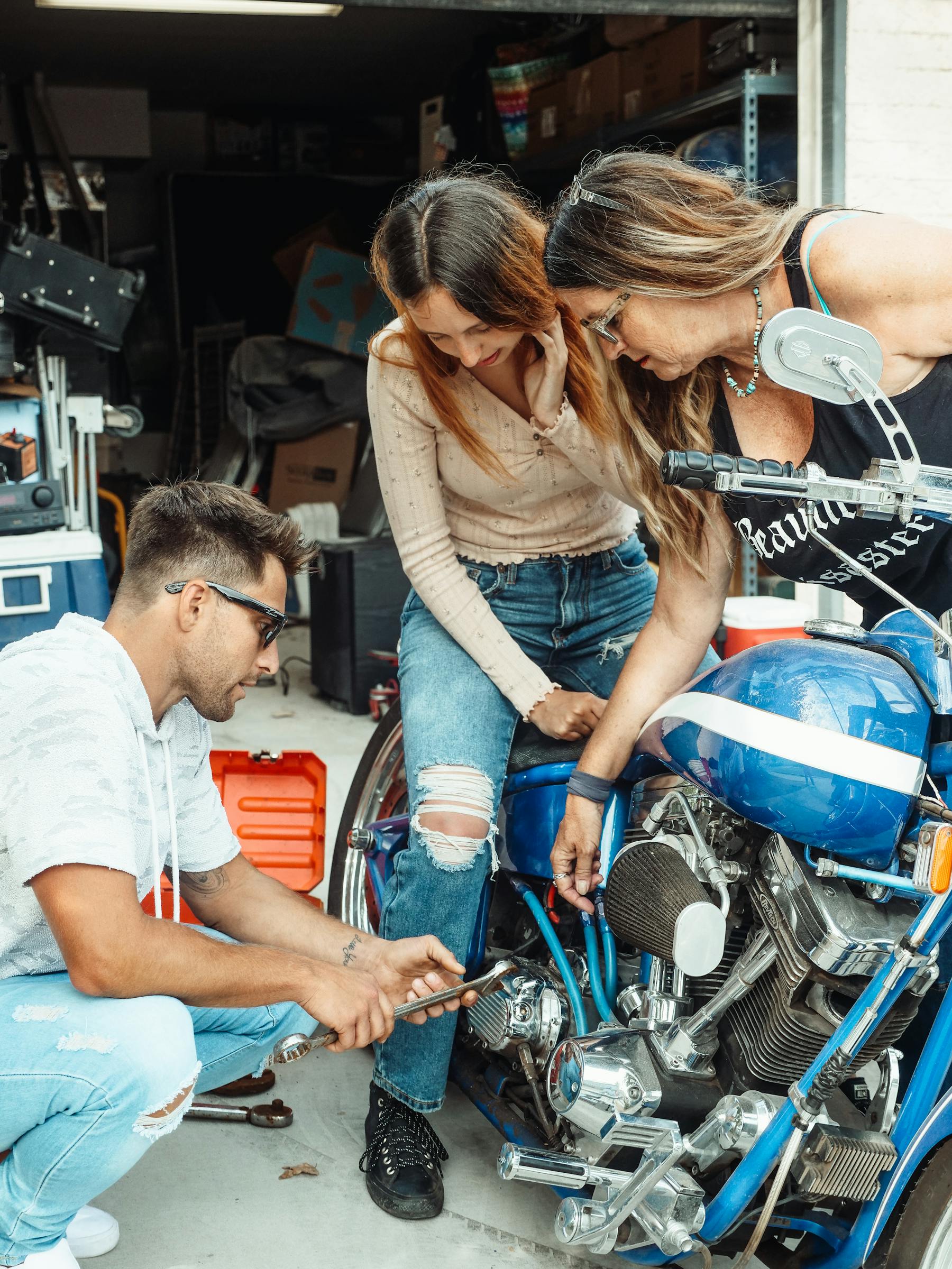 Family working together in a garage during a home repair moment