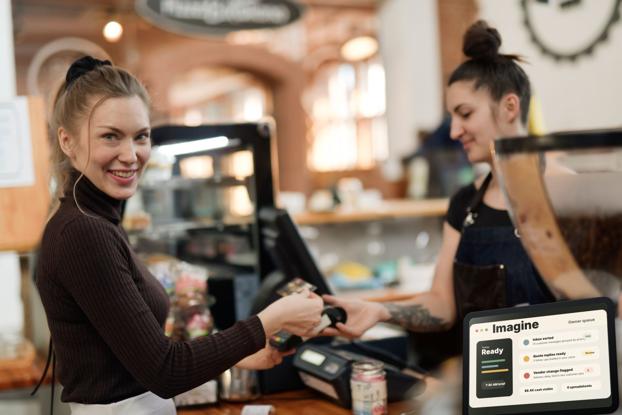 Restaurant owner privately reviewing Imagine at a staff-only station while customers dine nearby